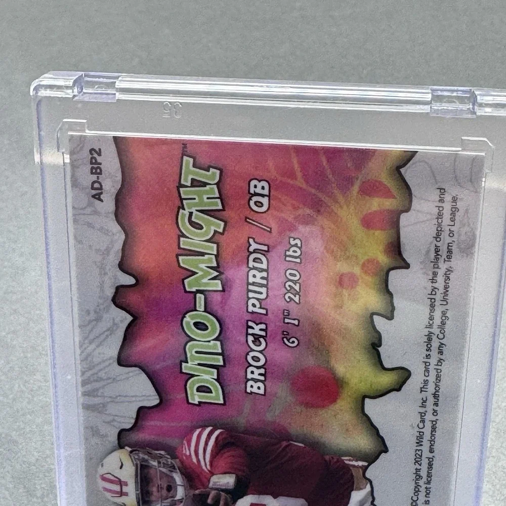 Brock Purdy Dino-Might Illumination‎ Wild Card Football QB Insert Parallel